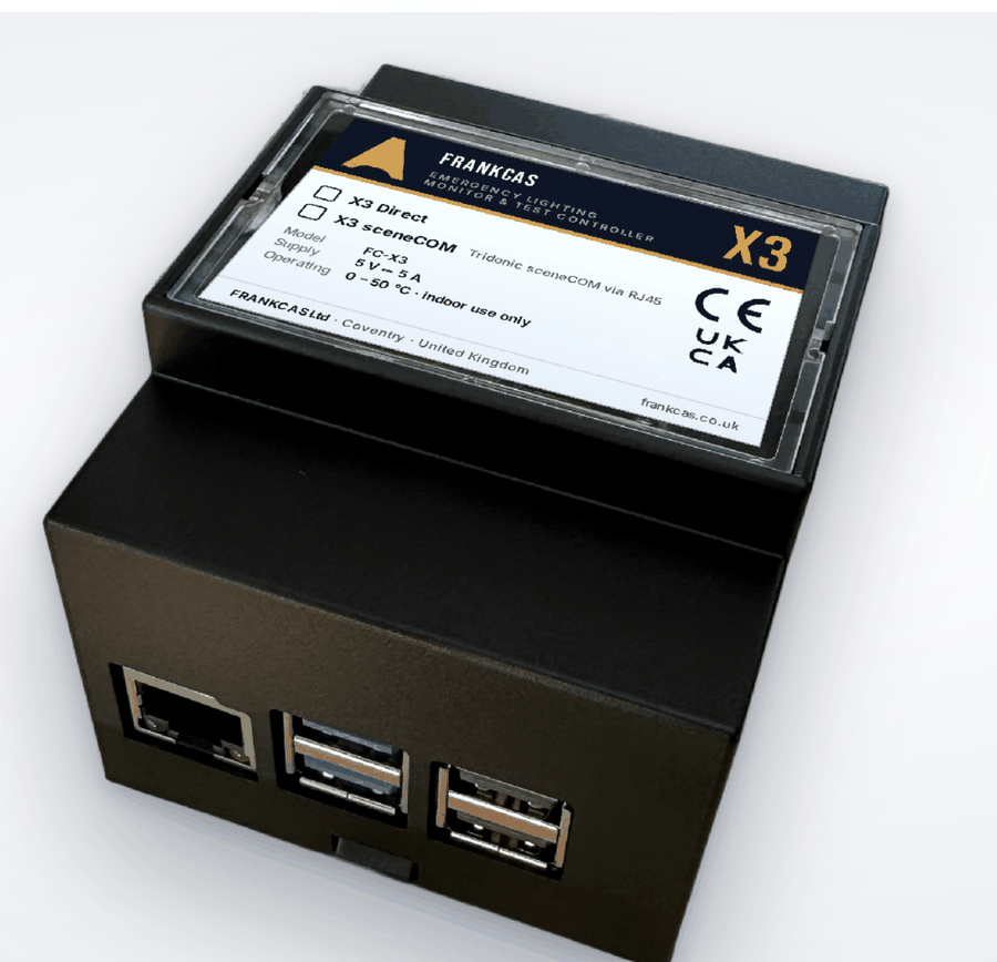 FRANKCAS X3 emergency lighting monitor and test controller, DIN rail mounted, showing Ethernet and USB ports